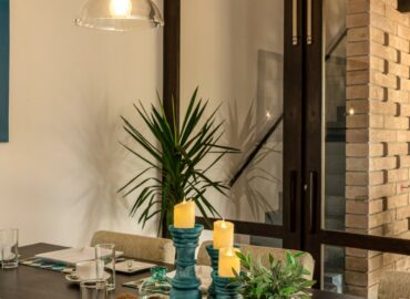 arranged dining table and chairs