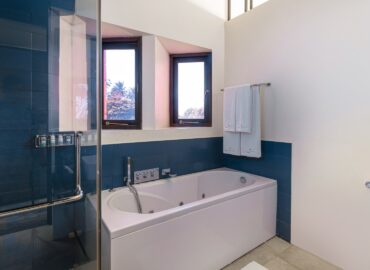 Arranged bathroom with bath towels