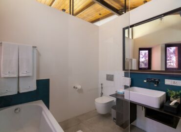 Arranged bathroom with bath towels